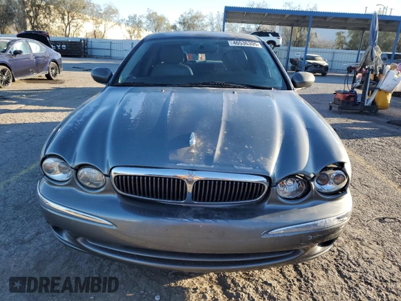 2004 Jaguar X-Type with VIN SAJEA51C74WD70684, listed as a Copart auction lot 46536395 with 155,184 mi miles and Salvage Title. Bid and sale history available at carsss.com. Image 5.
