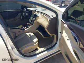 2012 Buick LaCrosse Leather with VIN 1G4GC5E37CF315557, listed as a IAAI auction lot 41852384 with 136,361 mi miles. Bid and sale history available at carsss.com. Image 5.