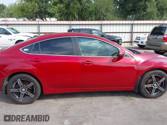 2009 Mazda 6 S Grand Touring with VIN 1YVHP82B895M20692, listed as a IAAI auction lot 42134552 with 264,332 mi miles and . Bid and sale history available at DreamBid. Image 13.