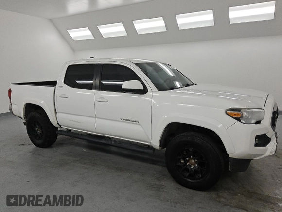 2020 Toyota Tacoma SR5 with VIN 3TMAZ5CN6LM114925, listed as a Copart auction lot 61650325 with 64,725 mi miles and Clean title. Bid and sale history available at DreamBid. Image 4.