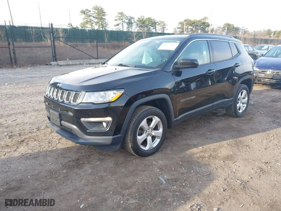 2019 Jeep Compass Latitude with VIN 3C4NJDBB9KT828935, listed as a IAAI auction lot 41865492 with 102,744 mi miles. Bid and sale history available at carsss.com. Image 2.