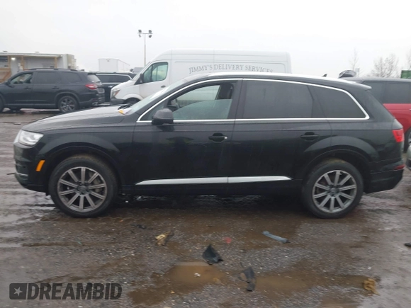 2019 Audi Q7 Premium with VIN WA1AHAF74KD029904, listed as a IAAI auction lot 41024012 with 79,896 mi miles and . Bid and sale history available at DreamBid. Image 14.