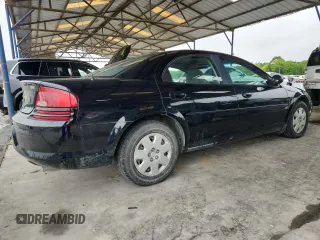 2002 Dodge Stratus SE z VIN 1B3EL36R02N198011, wystawiony jako Copart lot #58213505 z przebiegiem 104 464 mil mil oraz Tytuł czysty. Historia ofert i sprzedaży dostępna na DreamBid. Obrazek 3.