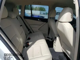 2017 Volkswagen Tiguan S z VIN WVGBV7AX4HK023629, wystawiony jako Copart lot #58272925 z przebiegiem 56 429 mil mil oraz Szkoda całkowita • Salvage title. Historia ofert i sprzedaży dostępna na DreamBid. Obrazek 11.