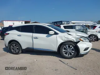 2015 Nissan Murano Platinum z VIN 5N1AZ2MH6FN271481, wystawiony jako IAAI lot #42154544 z przebiegiem 100 623 mil mil oraz . Historia ofert i sprzedaży dostępna na DreamBid. Obrazek 13.