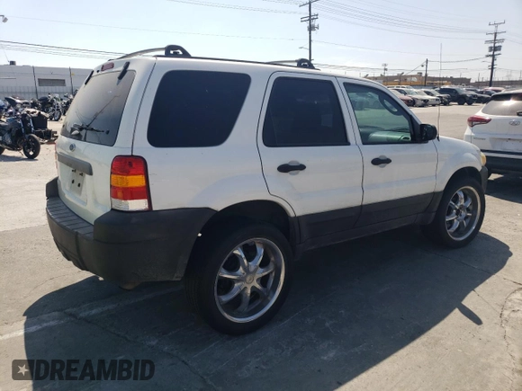 2006 Ford Escape XLS with VIN 1FMCU02Z36KA71926, listed as a Copart auction lot 57697364 with 225,212 mi miles and Salvage title. Bid and sale history available at DreamBid. Image 3.