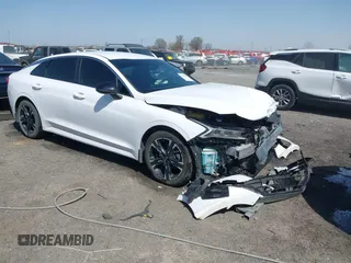 2024 Kia K5 GT-Line z VIN 5XXG64J20RG234249, wystawiony jako IAAI lot #41823685 z przebiegiem 33 168 mil mil oraz . Historia ofert i sprzedaży dostępna na DreamBid. Obrazek 1.