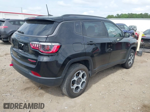 2022 Jeep Compass Trailhawk with VIN 3C4NJDDB8NT114134, listed as a IAAI auction lot 42428245 with 34,589 mi miles and . Bid and sale history available at DreamBid. Image 4.