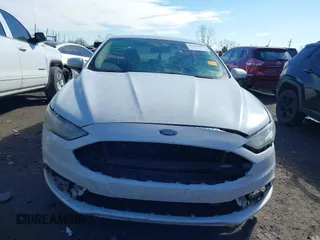 2017 Ford Fusion SE z VIN 3FA6P0H77HR277995, wystawiony jako IAAI lot #41586483 z przebiegiem 191 912 mil mil oraz . Historia ofert i sprzedaży dostępna na DreamBid. Obrazek 12.