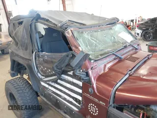 2001 Jeep Wrangler SE with VIN 1J4FA29P01P372136, listed as a IAAI auction lot 42013962 with 163,732 mi miles and . Bid and sale history available at DreamBid. Image 15.