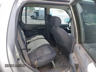 2004 Ford Explorer Sport Trac XLS z VIN 1FMZU77K64UB93602, wystawiony jako IAAI lot #42737380 z przebiegiem 224 488 mil mil oraz . Historia ofert i sprzedaży dostępna na DreamBid. Obrazek 8.