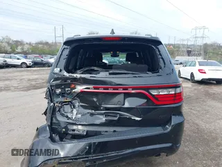 2019 Dodge Durango GT Plus with VIN 1C4RDJDG6KC561099, listed as a IAAI auction lot 41963187 with 104,153 mi miles and . Bid and sale history available at DreamBid. Image 17.