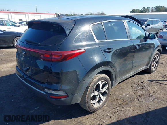 2020 Kia Sportage LX with VIN KNDPM3ACXL7808431, listed as a IAAI auction lot 41614114 with 123,400 mi miles. Bid and sale history available at carsss.com. Image 4.