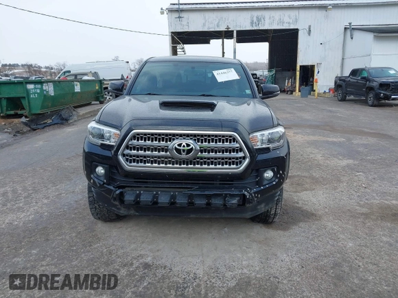 2016 Toyota Tacoma SR with VIN 3TMCZ5AN2GM027945, listed as a IAAI auction lot 41446277 with 51,781 mi miles and . Bid and sale history available at DreamBid. Image 13.