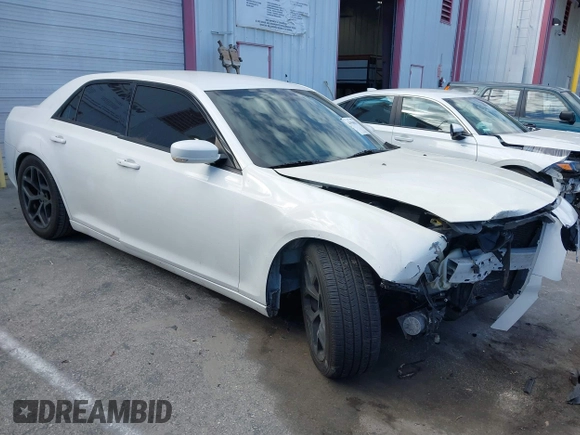 2014 Chrysler 300 S z VIN 2C3CCABG5EH344712, wystawiony jako IAAI lot #41594011 z przebiegiem 173 310 mil mil oraz . Historia ofert i sprzedaży dostępna na DreamBid. Obrazek 1.