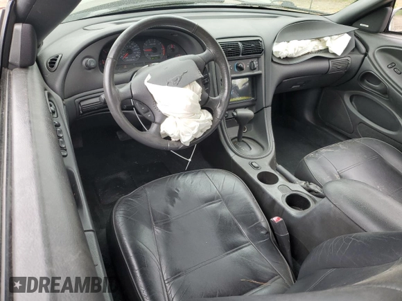 2002 Ford Mustang Deluxe с VIN 1FAFP44422F128062, выставлен на аукционе Copart как лот 57081075 с пробегом 85 392 миль миль и Чистый • Clean title. История ставок и продаж доступна на DreamBid. Изображение 8.