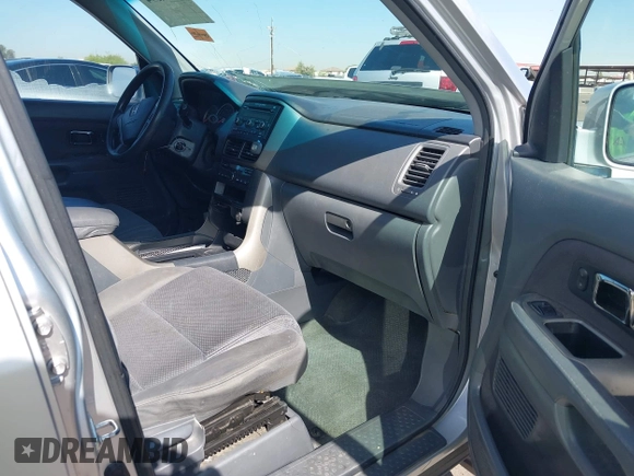 2006 Honda Pilot EX with VIN 5FNYF28436B028888, listed as a IAAI auction lot 42014594 with 219,180 mi miles and . Bid and sale history available at DreamBid. Image 5.