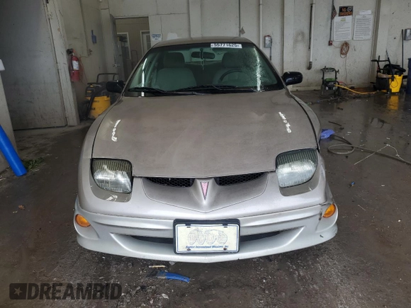 2002 Pontiac Sunfire SE z VIN 1G2JB524627155677, wystawiony jako Copart lot #55771625 z przebiegiem 169 305 mil mil oraz Szkoda całkowita • Salvage title. Historia ofert i sprzedaży dostępna na DreamBid. Obrazek 5.