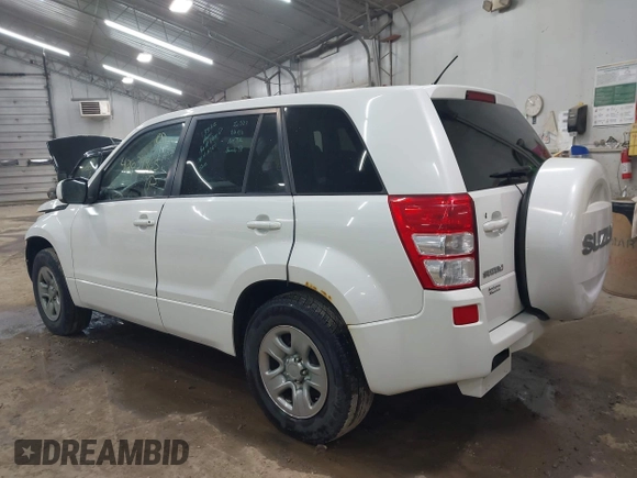 2012 Suzuki Grand Vitara Premium with VIN JS3TD0D26C4100406, listed as a IAAI auction lot 42039965 with 106,671 mi miles and . Bid and sale history available at DreamBid. Image 3.