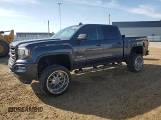 2017 GMC Sierra 1500 SLT z VIN 3GTU2NEC4HG518549, wystawiony jako Copart lot #56894335 z przebiegiem 127 021 mil mil oraz Tytuł czysty. Historia ofert i sprzedaży dostępna na DreamBid. Obrazek 1.