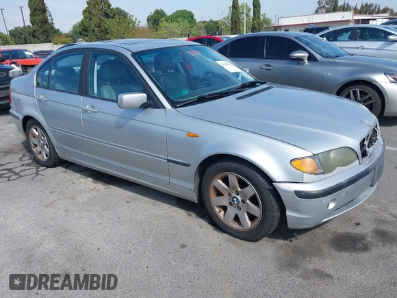 2002 BMW 3 Series 325i with VIN WBAET37492NG83135, listed as a IAAI auction lot 42028502 with 184,216 mi miles. Bid and sale history available at carsss.com. Image 1.