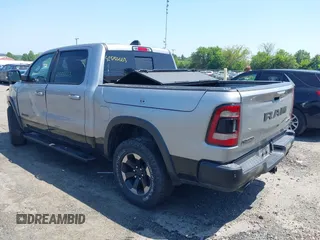 2019 Ram 1500 Rebel with VIN 1C6SRFLT8KN797618, listed as a IAAI auction lot 42556663 with 92,606 mi miles and . Bid and sale history available at DreamBid. Image 3.