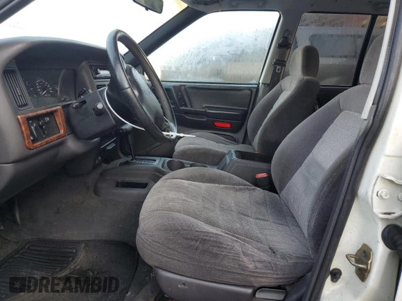 1997 Jeep Grand Cherokee TSi with VIN 1J4FX58S2VC612449, listed as a Copart auction lot 43532675 with 221,382 mi miles and Salvage Title. Bid and sale history available at carsss.com. Image 7.