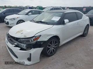 2016 Scion tC with VIN JTKJF5C75GJ016412, listed as a IAAI auction lot 42068497 with 1 mi miles. Bid and sale history available at carsss.com. Image 2.