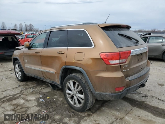 2011 Jeep Grand Cherokee 70th Anniversary with VIN 1J4RR4GG2BC676162, listed as a Copart auction lot 46848245 with 183,760 mi miles and Salvage Title. Bid and sale history available at carsss.com. Image 2.