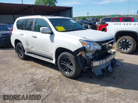 2013 Lexus GX 460 Premium z VIN JTJJM7FX8D5056053, wystawiony jako IAAI lot #42167295 z przebiegiem 189 652 mil mil oraz . Historia ofert i sprzedaży dostępna na DreamBid. Obrazek 1.