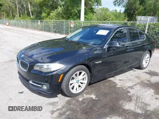 2015 BMW 5 Series 528i with VIN WBA5A5C57FD512845, listed as a IAAI auction lot 41954256 with 174,944 mi miles. Bid and sale history available at carsss.com. Image 2.