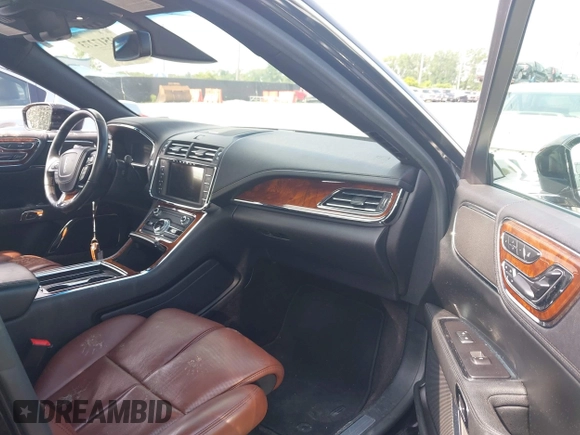 2017 Lincoln Continental Reserve with VIN 1LN6L9NP3H5620069, listed as a IAAI auction lot 42517273 with 63,500 mi miles and . Bid and sale history available at DreamBid. Image 5.