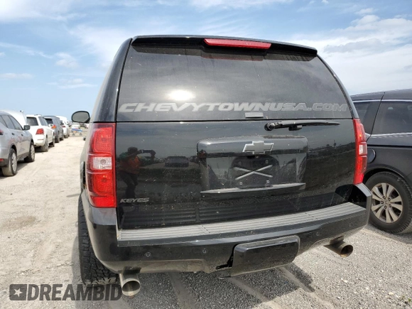 2013 Chevrolet Suburban with VIN 1GNWKMEG4DR257785, listed as a Copart auction lot 76817344 with 68,021 mi miles and Salvage title. Bid and sale history available at DreamBid. Image 6.