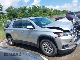 2019 Chevrolet Traverse LT Cloth z VIN 1GNERGKW3KJ293483, wystawiony jako IAAI lot #42524003 z przebiegiem 82 611 mil mil oraz . Historia ofert i sprzedaży dostępna na DreamBid. Obrazek 13.