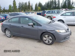 2014 Honda Civic LX with VIN 19XFB2F57EE240843, listed as a IAAI auction lot 42108281 with 255,157 mi miles and . Bid and sale history available at carsss.com. Image 13.