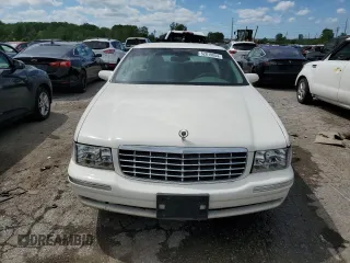 1999 Cadillac DeVille z VIN 1G6KD54Y7XU801251, wystawiony jako Copart lot #52819854 z przebiegiem 180 871 mil mil oraz Szkoda całkowita • Salvage title. Historia ofert i sprzedaży dostępna na DreamBid. Obrazek 5.