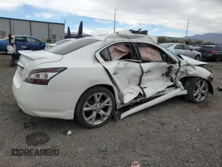 2014 Nissan Maxima SV with VIN 1N4AA5AP0EC471118, listed as a Copart auction lot 49008295 with 98,501 mi miles and Salvage title. Bid and sale history available at DreamBid. Image 3.