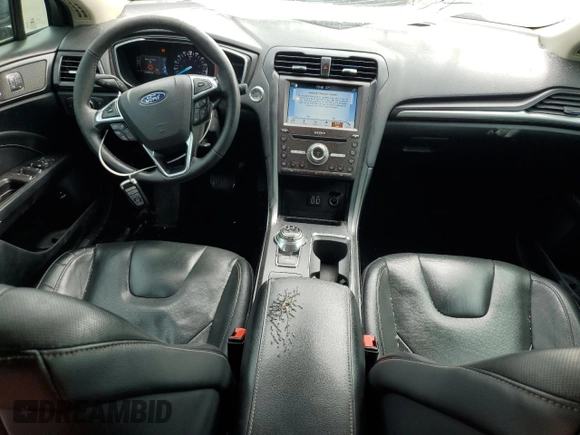 2019 Ford Fusion Titanium z VIN 3FA6P0RU4KR211674, wystawiony jako Copart lot #62205885 z przebiegiem 313 261 mil mil oraz Szkoda całkowita • Salvage title. Historia ofert i sprzedaży dostępna na DreamBid. Obrazek 8.
