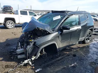 2019 Jeep Compass Latitude with VIN 3C4NJDBB1KT648185, listed as a IAAI auction lot 41622077 with 74,072 mi miles and . Bid and sale history available at DreamBid. Image 2.