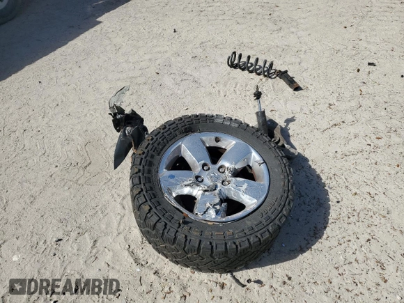 2015 Ram 1500 Outdoorsman z VIN 1C6RR6LT1FS729196, wystawiony jako Copart lot #81125114 z przebiegiem Nie podano mil oraz Szkoda całkowita • Salvage title. Historia ofert i sprzedaży dostępna na DreamBid. Obrazek 13.