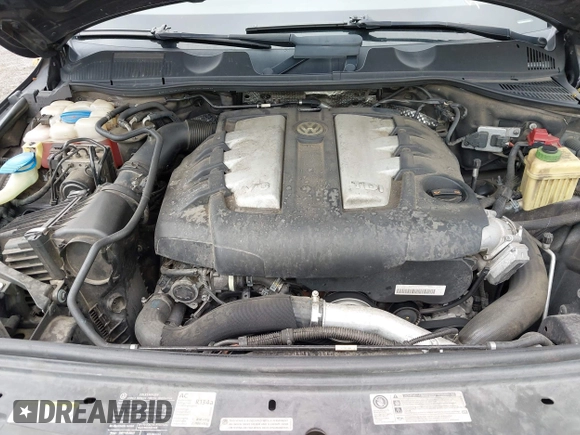2012 Volkswagen Touareg Sport with VIN WVGFK9BP0CD002939, listed as a IAAI auction lot 42531654 with 222,435 mi miles and . Bid and sale history available at DreamBid. Image 10.