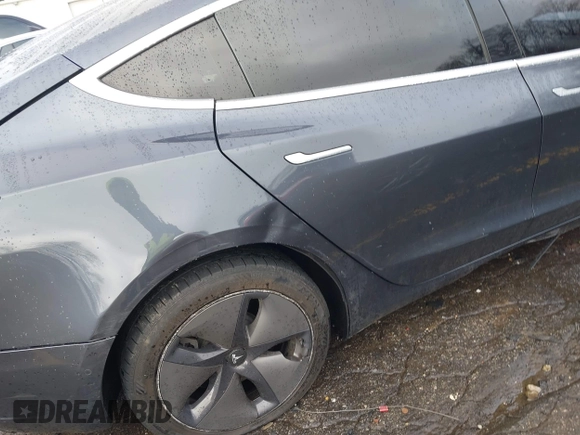 2019 Tesla Model 3 Mid Range with VIN 5YJ3E1EA3KF426971, listed as a IAAI auction lot 41564939 with Not Provided miles and . Bid and sale history available at carsss.com. Image 22.