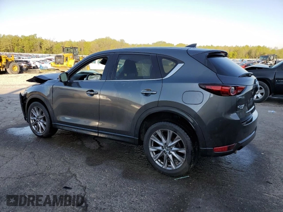 2019 Mazda CX-5 Grand Touring with VIN JM3KFBDM9K0676795, listed as a Copart auction lot 52129885 with 71,869 mi miles and Salvage Title. Bid and sale history available at carsss.com. Image 2.