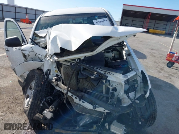 2015 Toyota Tacoma with VIN 3TMLU4EN8FM184297, listed as a IAAI auction lot 41759278 with 116,158 mi miles and . Bid and sale history available at DreamBid. Image 6.