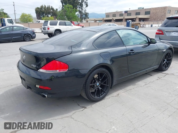 2006 BMW 6 Series 650Ci with VIN WBAEH13436CR50523, listed as a IAAI auction lot 42046873 with 111,765 mi miles. Bid and sale history available at carsss.com. Image 4.