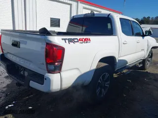2019 Toyota Tacoma 4WD SR with VIN 3TMCZ5ANXKM195356, listed as a IAAI auction lot 41374965 with 177,927 mi miles. Bid and sale history available at carsss.com. Image 4.