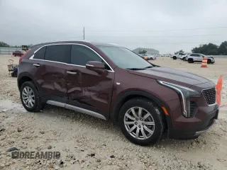 2023 Cadillac XT4 FWD Premium Luxury with VIN 1GYFZCR48PF100078, listed as a Copart auction lot 55955865 with 23,509 mi miles and Salvage title. Bid and sale history available at DreamBid. Image 4.