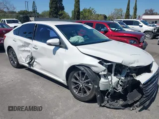 2016 Toyota Avalon Limited with VIN 4T1BK1EB4GU216774, listed as a IAAI auction lot 41861690 with 113,153 mi miles and . Bid and sale history available at carsss.com. Image 13.