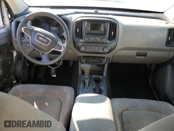 2015 GMC Canyon 2WD with VIN 1GTG5AE38F1156671, listed as a Copart auction lot 85194924 with 123,597 mi miles and Salvage Title. Bid and sale history available at DreamBid. Image 8.