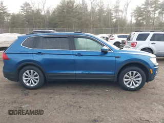 2019 Volkswagen Tiguan SE with VIN 3VV2B7AX4KM017280, listed as a IAAI auction lot 41786487 with 119,949 mi miles and . Bid and sale history available at DreamBid. Image 13.